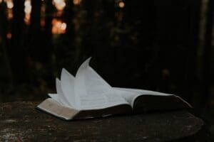 Bible pages flipping in the wind